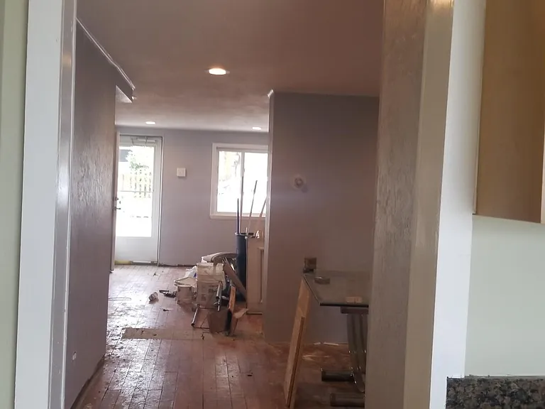 view of front door from kitchen