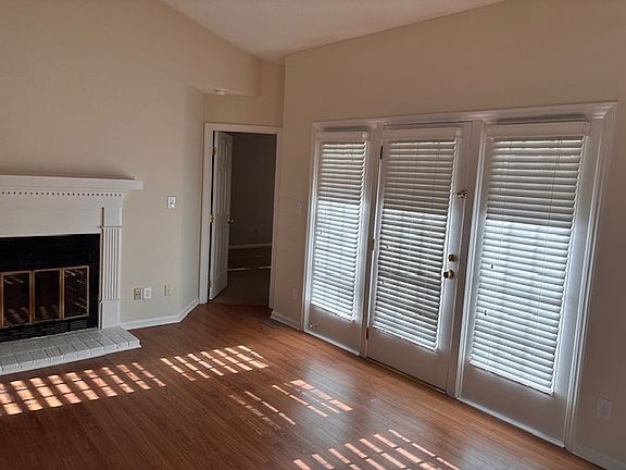 Living room with access to master bedroom and back deck.