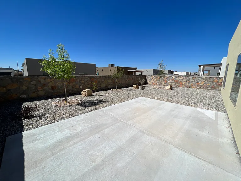 The yard has plenty of room to relax and unwind.