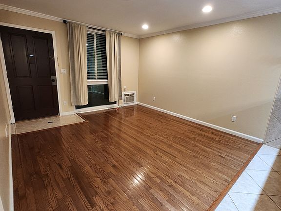 WELCOME. Hardwood floors and tiled create a clean, warm feeling. Also, easy to maintain.