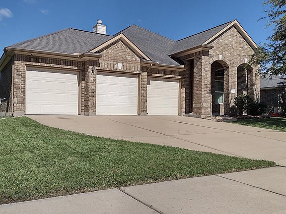 Front view of the house w/ 3-car garage