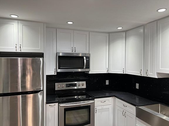 3rd image of 6815 Remmet Ave Unit 211