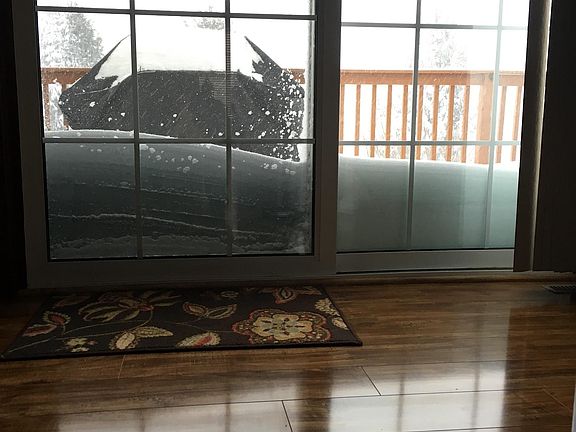 Hardwood, kitchen sliding glass door to deck