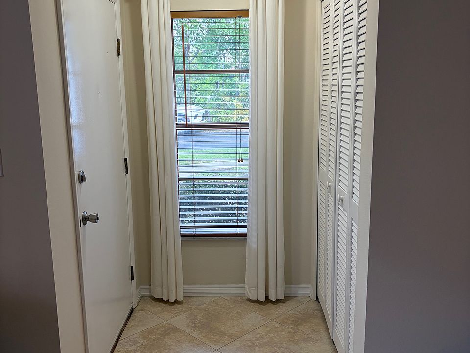 Foyer with coat closet.