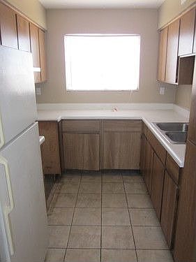 5th image of 7138 N 66th Dr APT 102