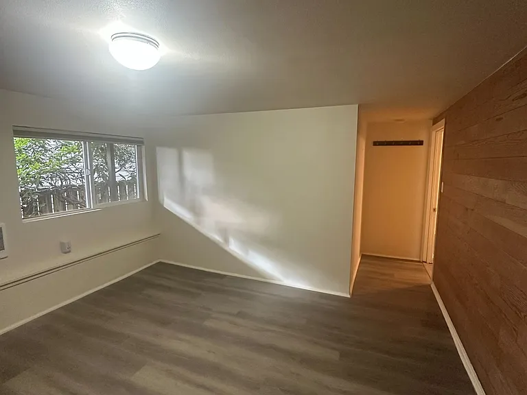 Second bedroom shown unfurnished.
