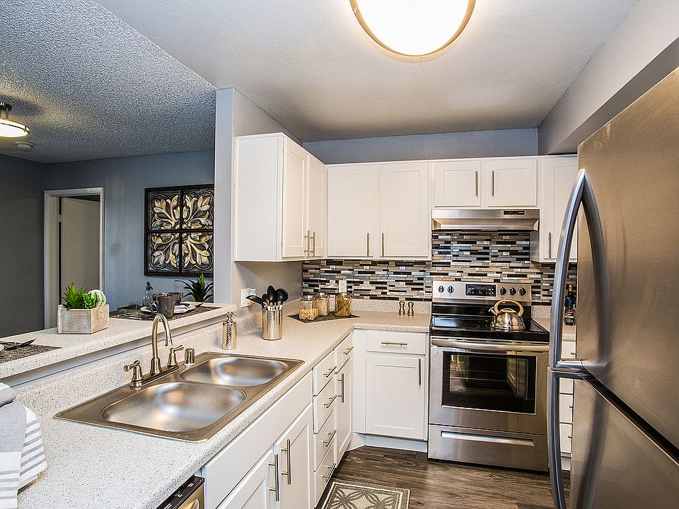 Explore this chic and functional kitchen, perfect for culinary enthusiasts.
