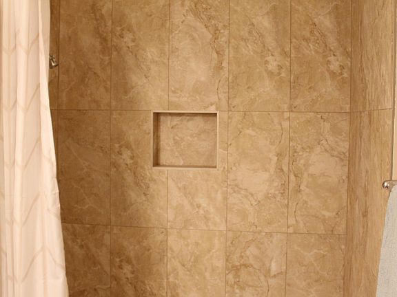 brand newly renovated shower and tub.