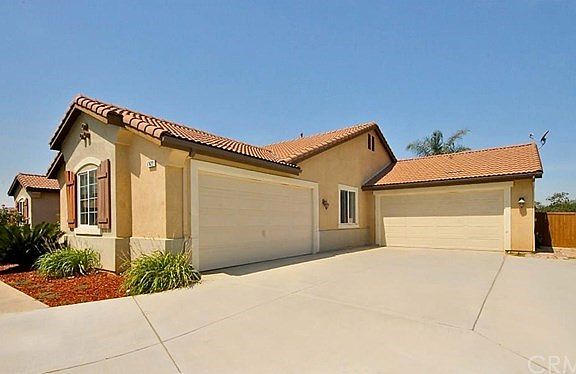 3-car side-facing garage (finished) & potential for RV parking