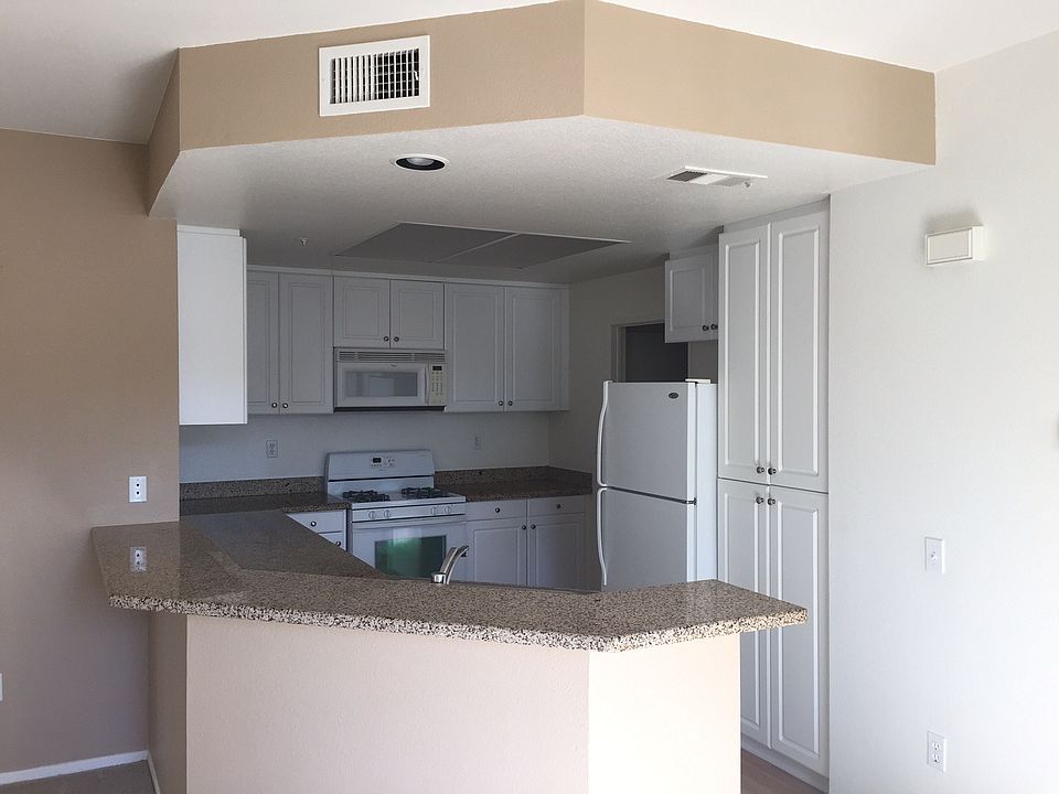 Prepare meals in a gorgeous kitchen with granite countertops