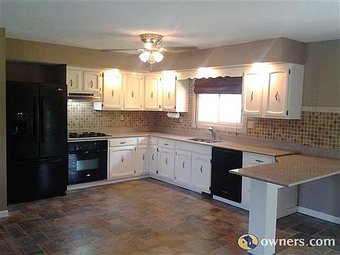 Kitchen with slate floors and granite counter tops