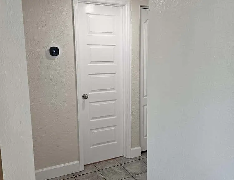 Hallway with smart thermostat