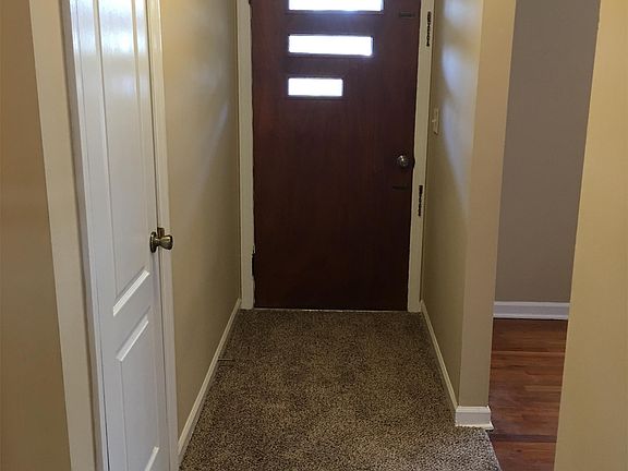Hallway to living room and front door