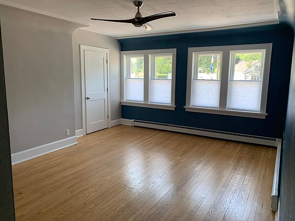 Large living room with lots of natural light.