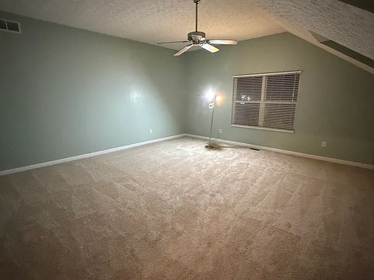 Large bonus room 20 ft x 20 ft with ample windows on two sides. Can be used as 5th bedroom or media room.