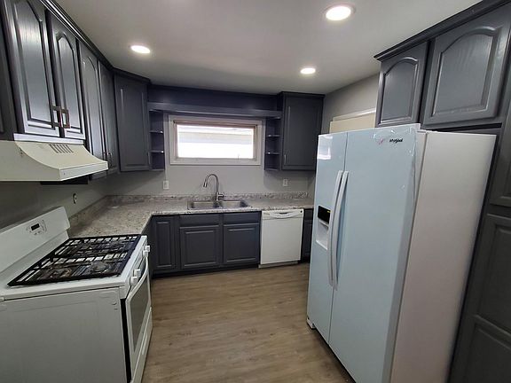 Updated kitchen with loads of cabinets and all appliances