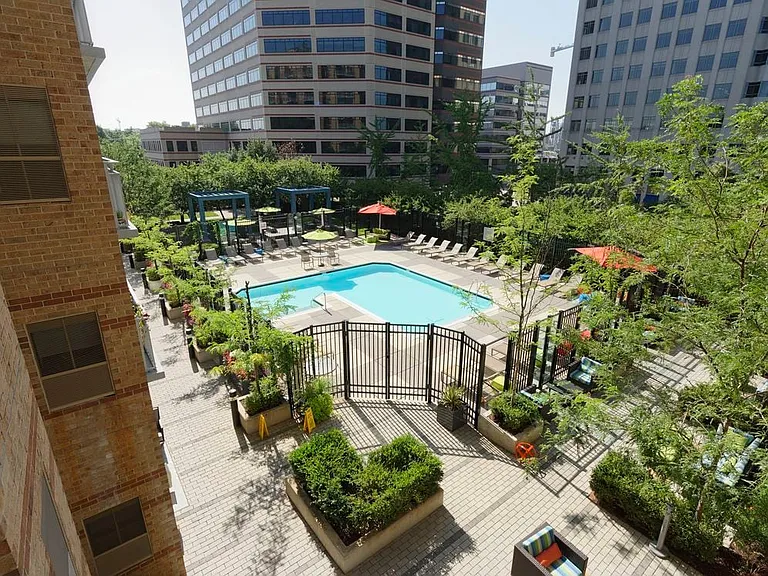 Courtyard with pool, sundeck and lounge seating