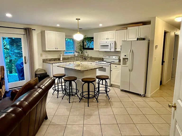 Kitchen and kitchen island with breakfast bar