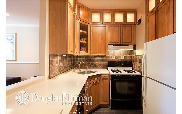 Sold by Douglas Elliman | media 18