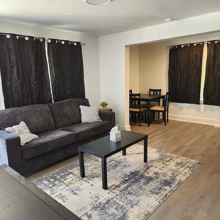 Living area and a view of the dinning room area.
