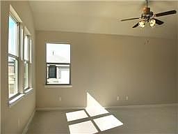 Corner of living room.. 3 windows.. great light for the space