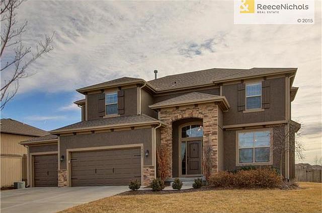 Popular, Hilmann Fenwick IV plan with inviting entrance.