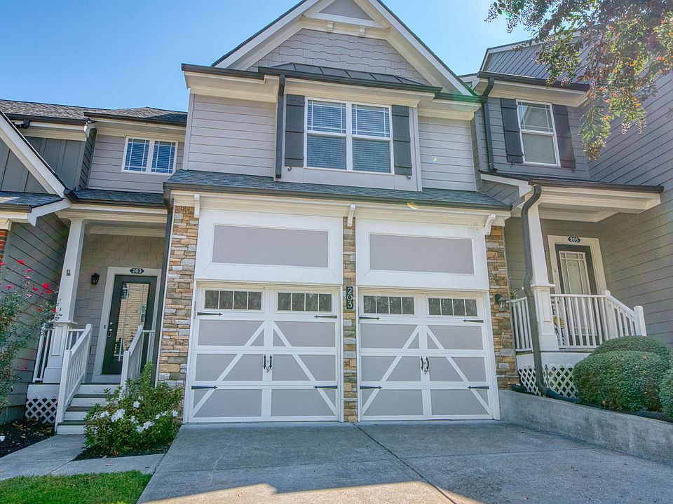 Exterior front. Two-car garage with ample driveway parking