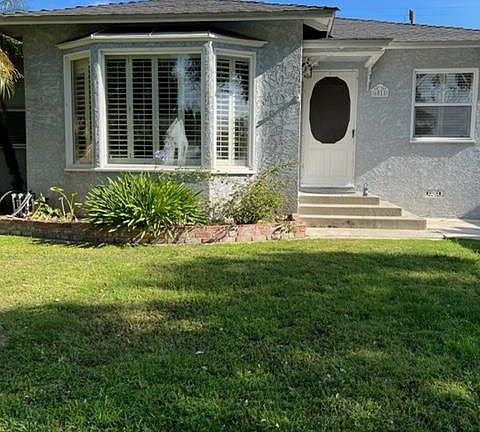 Front livingroom window with plantation like shutters