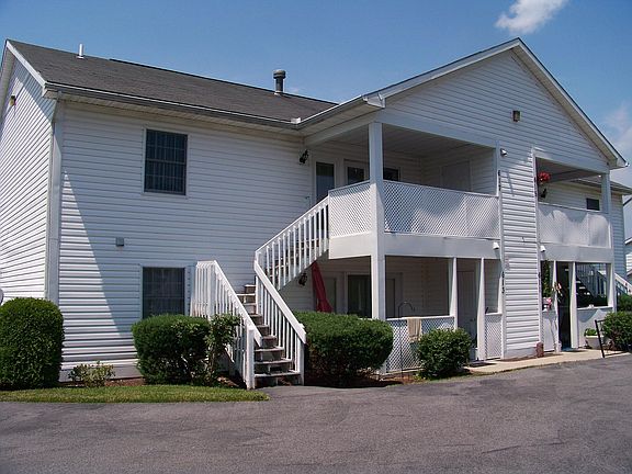Private back porch entrances w/ off street parking
