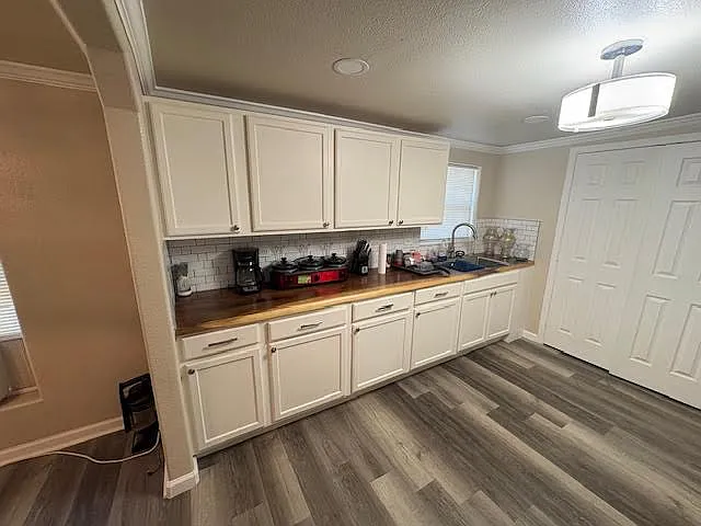 Drop in sink with more cabinets.