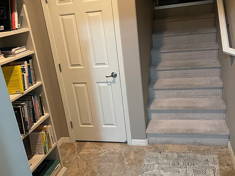 First level , entry to 2nd bedroom
Laundry , and two car garage