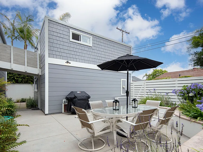 Back patio area includes new BBQ, dining area also fully gated! Great for kids!