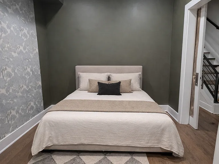 The office currently has a desk but the owner will provide a new full-sized bed if that is the preference