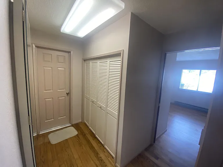 Washer/Dryer Closet, Door to Garage & Medium Bedroom
