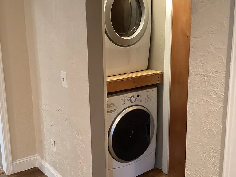 Washer and dryer in hallway.