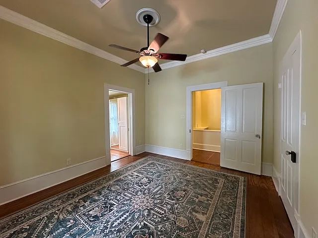 The Master Bedroom with access to its closet to the left.