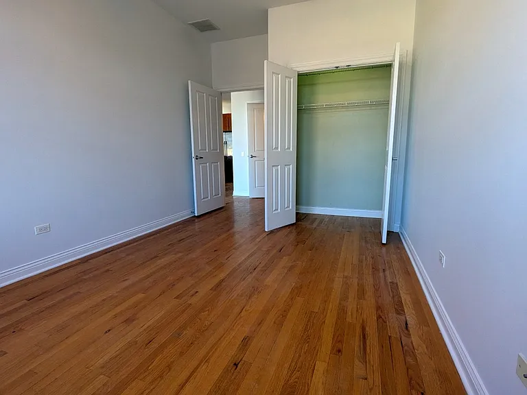 The 2nd bedroom has been freshly painted in a lighter neutral tone