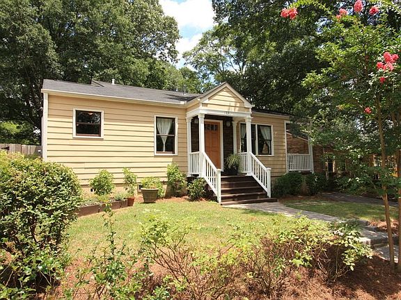 Home has it all PLUS a great deck, cozy side porch, and an expansive yard.