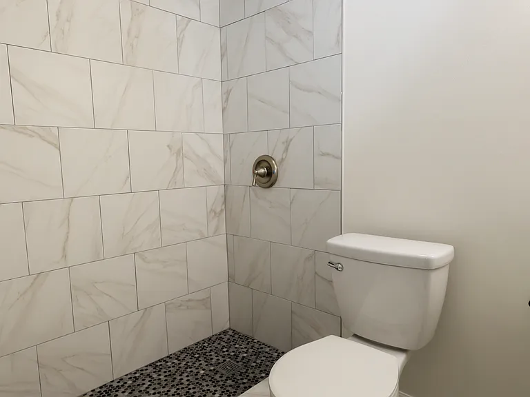 Master Bathroom with beautiful tiled shower and floor!
