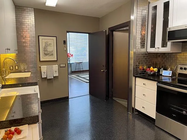 solid core doors from garage to kitchen and then to great room