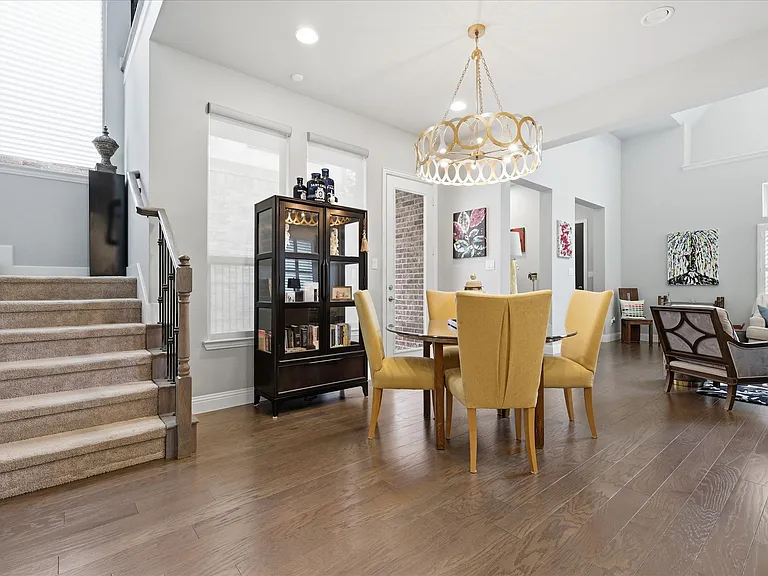 Open-concept dining space seamlessly transitions from casual everyday meals to upscale entertaining