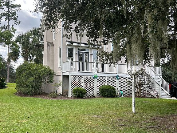 Back of home. Spacious yard!