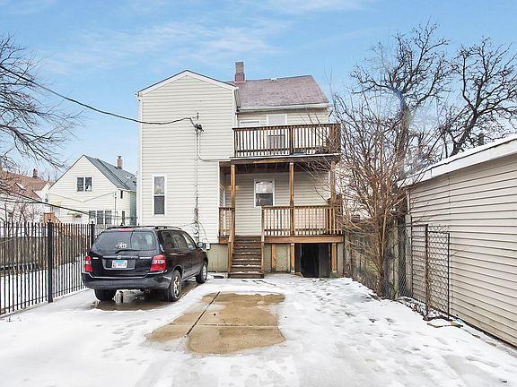 Rear side of house Porch, balcony, walkway to front side of house, and free private parking lot