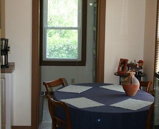 Eat in area connected leading in to laundry room