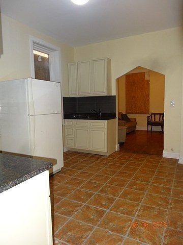 1st image of 8412 S Buffalo Ave #1REAR