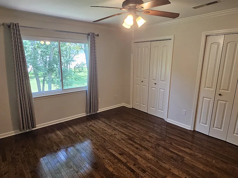 Incredible view from primary bedroom. Two large closets with storage systems.