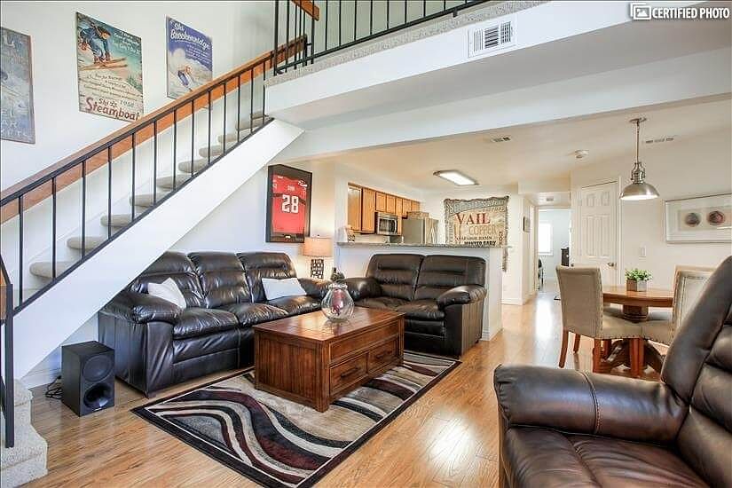 Luxury living room with kitchen granite count