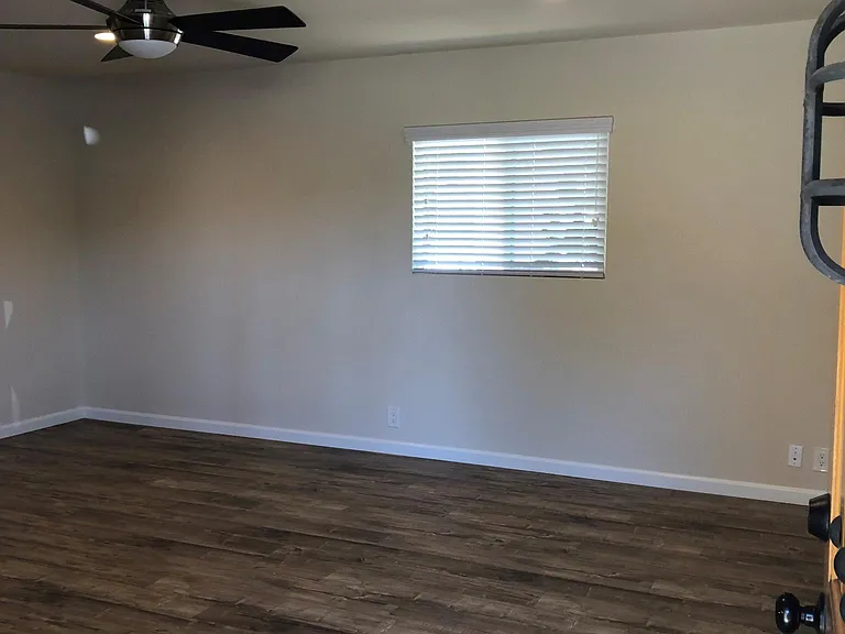 Living room - accessible from front door and deck. Open to kitchen.