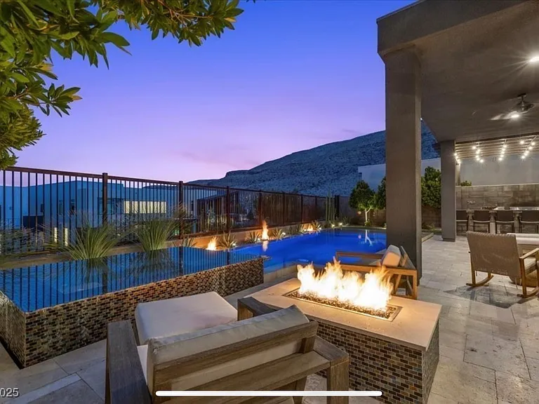#GuardianRealty 10941 Earth Hues Summerlin Luxury Home Rental twilight fire pool_07032026