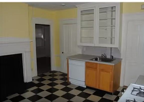 Eat in kitchen with original cabinets